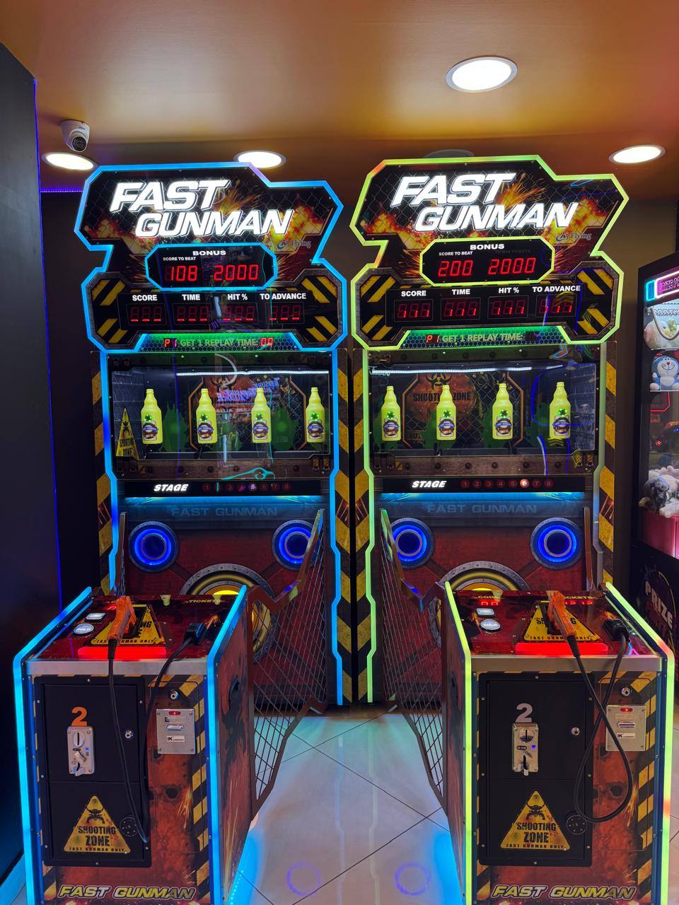 Fast Gunman dual light-gun shooting cabinets with bottle targets